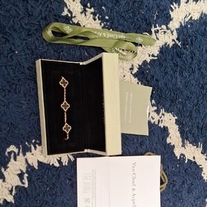 Van Cleef & Arpels Onyx And 18k Gold Motif Bracelet